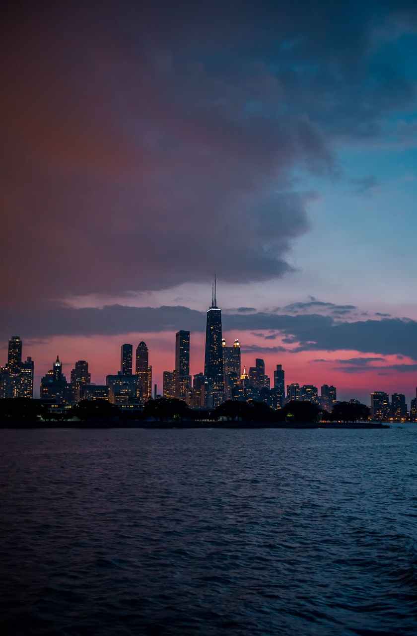 high rise buildings near body of water