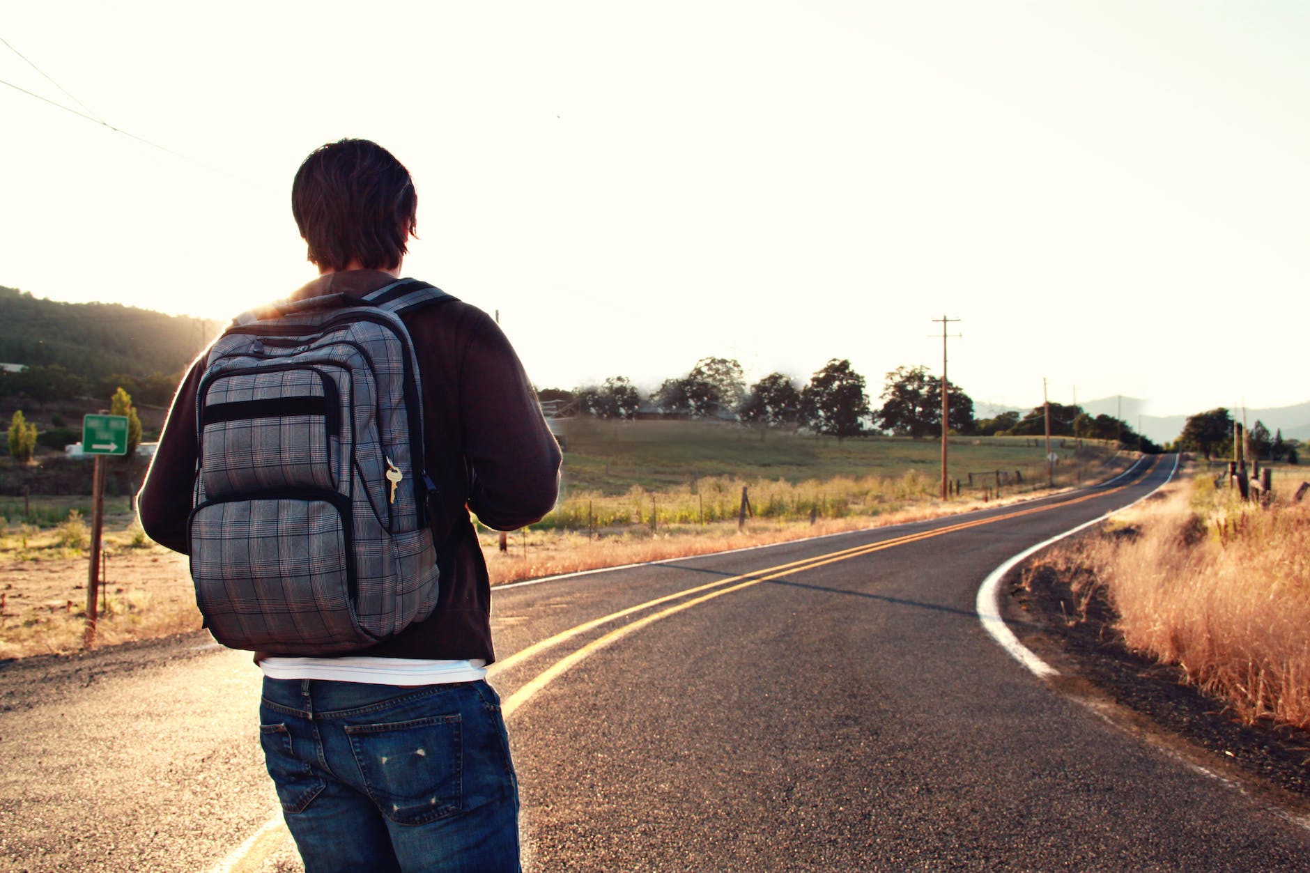 man facing road thinking about gratitude practice ideas. 